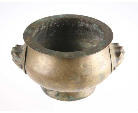 A 19TH CENTURY CHINESE BRONZE CENSER with two mythical creature head handles. Approx. 23.5cm wide across handles