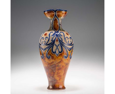 FRANK A. BUTLER FOR DOULTON LAMBETH, A LATE 19TH CENTURY STONEWARE VASE of baluster form with a flared lobed neck, decorated 