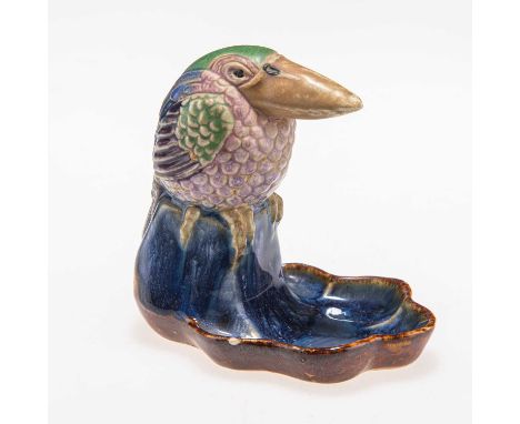 A ROYAL DOULTON LAMBETH STONEWARE BIBELOT TRINKET DISH, CIRCA 1930S modelled as a kookaburra perched upon a shell dish, glaze