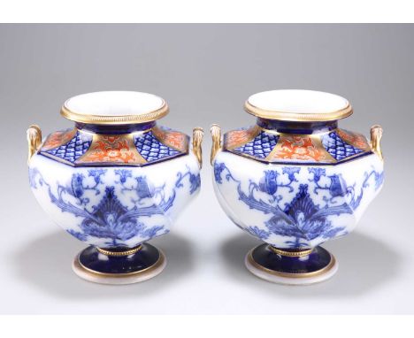 A PAIR OF LATE 19TH CENTURY JAMES MACINTYRE &amp; CO BURSLEM AURELIAN WARE PEDESTAL VASES of fluted octagonal form with scrol