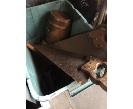 A box containing misc tools including saws, gardening tools, some ornamental items, etc 