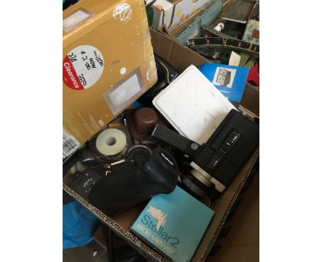A box of cameras and camera equipment 