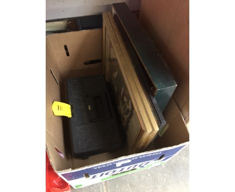 A box of prints and an empty toolbox 