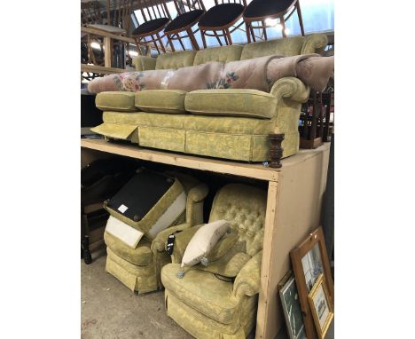 A  3 piece suite with electric reclining armchair and pouffe 