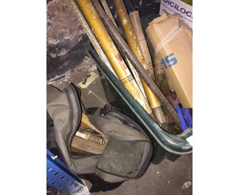 A green crate and a bag of various tools 