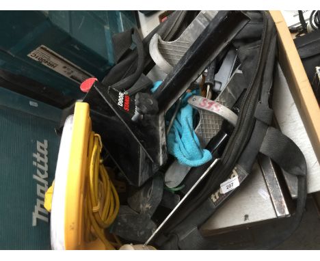 A bag of door stands, 110V safety light, misc tools, etc 