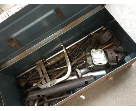 A metal toolbox and tools 