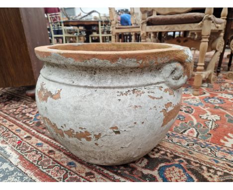 A COMPTON TYPE TERRACOTTA PLANTER TOGETHER WITH ANOTHER OF LIBERTY TYPE WITH RELIEF FLORAL DECORATION ABOUT THE TWO LUG HANDL