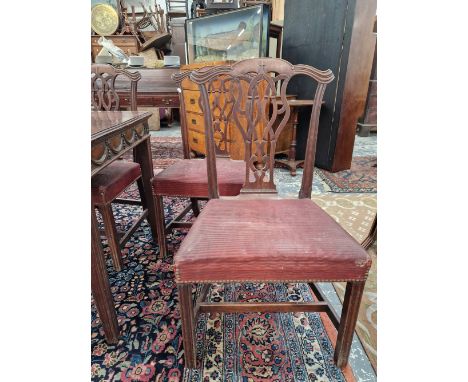 A SET OF SIX 19th C. MAHOGANY CHIPPENDALE STYLE DINING CHAIRS WITH RED UPHOLSTERED SEATS ABOVE CHANNELLED SQUARE SECTION FRON