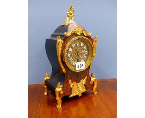 A BOULLE BALLOON CASED MANTEL TIMEPIECE, THE CIRCULAR BEADED ORMOLU BEZEL ENCLOSING THE ENAMEL NUMBER PLATES OF THE CHAPTER R