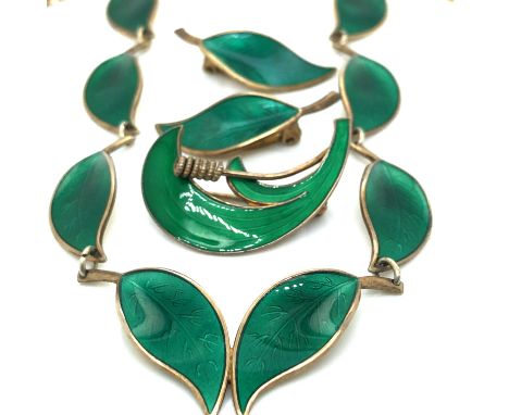 A DAVID ANDERSEN NORWAY SILVER GILT AND ENAMEL LEAF NECKLACE AND EARRING SET DESIGNED BY WILLY WINNAESS TOGETHER WITH A SIMIL