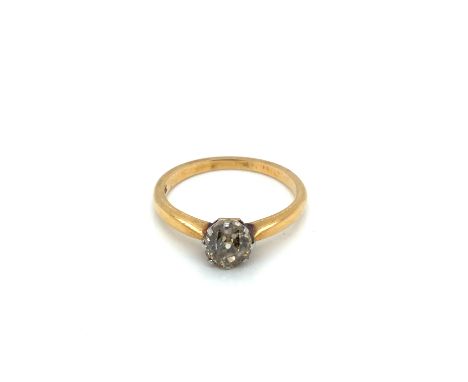 AN OLD CUT DIAMOND SOLITAIRE RING. THE DIAMOND HELD IN AN EIGHT CLAW SETTING UPON A PLAIN POLISHED SHANK. THE INSIDE STAMPED 