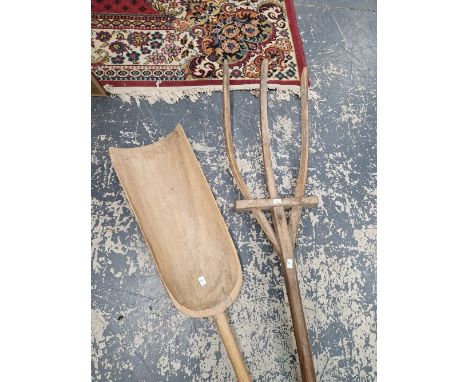 A MALT SHOVEL AND A MALT THREE PRONGED FORK, THE LATTER.   184cms.