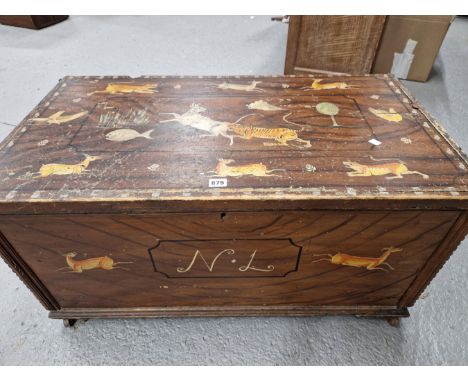 AN INDIAN STYLE PAINTED PINE COFFER DEPICTING TIGERS HUNTING DEER ON A FAUX BOIS GROUND. W 91.5 x D 50.5 x H 45cms.