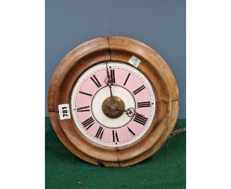 A T. LOVEJOY OF WIMBLEDON POSTMANS ALARM CLOCK STRIKING ON A BELL, THE BRASS ALARM DIAL CENTRAL TO THE PINK ENAMEL CHAPTER RI