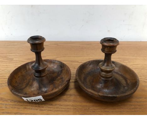 A OLIVE WOOD BRIGHTON BUN CAMPAIGN CANDLESTICK PAIR. 