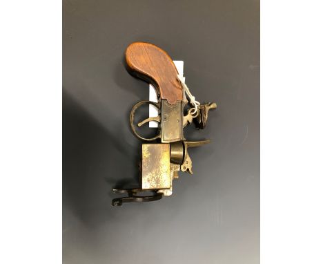 A DUNHILL FLINTLOCK PETROL FIRED CIGARETTE LIGHTER
