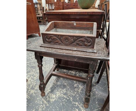 A LINED CARVED OAK PLANTER TOGETHER WITH A CARVED OAK COFFEE TABLE