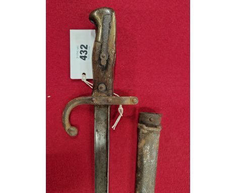 AN 1876 PATTERN FRENCH BAYONET IN AN IRON SCABBARD