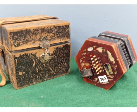 A LEATHER BOXED LACHENAL CONCERTINA NUMBERED 59O76