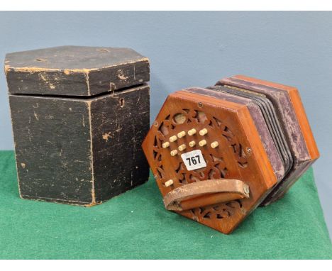 A WOODEN CASED LACHENAL CONCERTINA, THE MAHOGANY ENDS.   W 16cms.