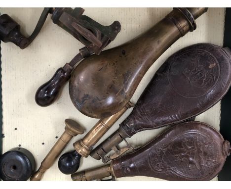 AN ANTIQUE GUN POWDER FLASK BY INGRAM, TWO LEATHER SHOT FLASKS, A WAD CUTTER, LOADING TOOLS ETC.