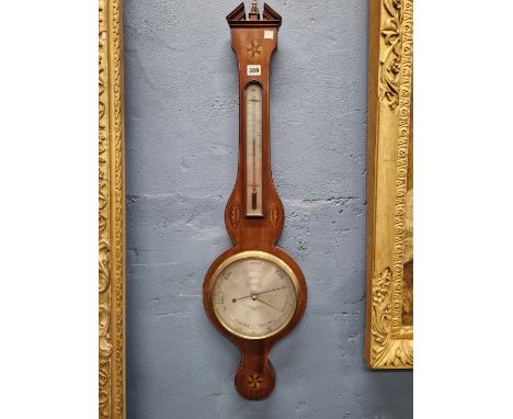 A MAHOGANY BANJO BAROMETER BY GATTI OF READING, SHELL AND ROSETTE MARQUETRY ABOUT THE SILVERED DIAL AND ALCOHOL THERMOMETER