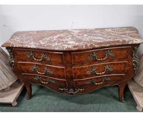 A FRENCH STYLE ROSEWOOD BOMBE COMMODE WITH VARIEGATED BROWN MARBLE TOP,   THE TWO BANKS OF THREE DRAWERS FLANKED BY ORMOLU FO