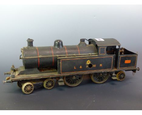 A BASSETT LOWKE 0 GUAGE L &amp; NWR TIN PLATE CLOCK WORK LOCOMOTIVE, TWO LNWR GOODS WAGONS, A J T LOWKE BOILER WAGON, A COLMA