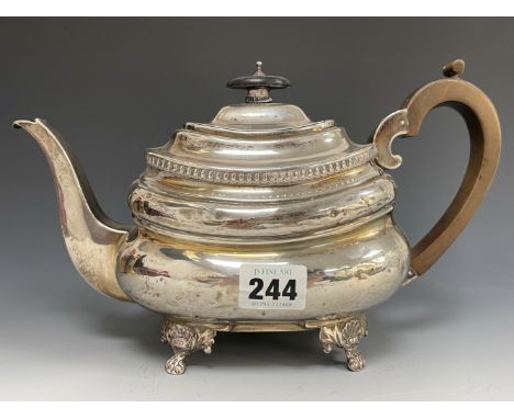 A GEORGE III SILVER TEA POT BY THOMAS HARPER, LONDON 1811, A BEAD BAND ON THE ROUNDED RECTANGULAR SHOULDERS ABOVE THE FOUR PA