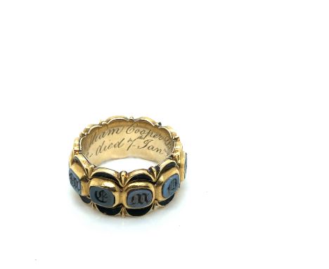 AN ANTIQUE GEORGIAN MOURNING RING. THE RING SET WITH CARVED SARDONYX AND BACK ENAMEL READING IN MEMORY OF. ENGRAVED TO THE IN