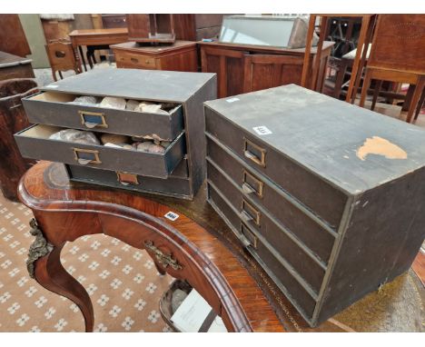 TWO FOUR DRAWER TABLE TOP CHESTS OF SPECIMEN STONES, SOME SHAPED INTO TOOLS TOGETHER WITH A TRUG OF FURTHER STONES