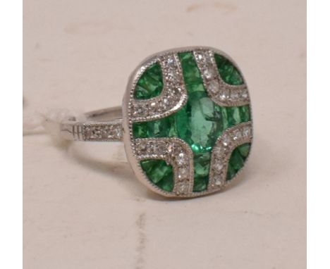 A platinum Art Deco style emerald and diamond panel ring, approx. ring size M½ 