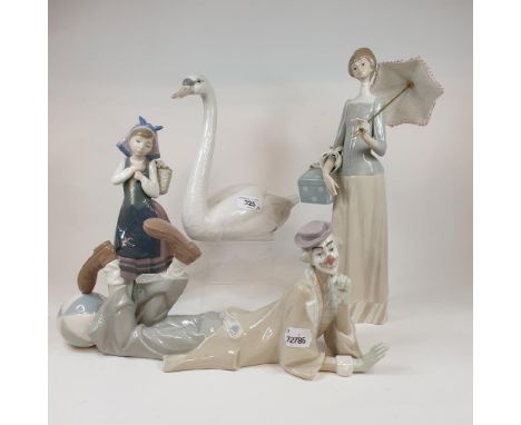 A Lladro figure of a girl, carrying flowers, 26.5 cm high, a Lladro figure of a lady, with a parasol, 25 cm high, a Lladro sw