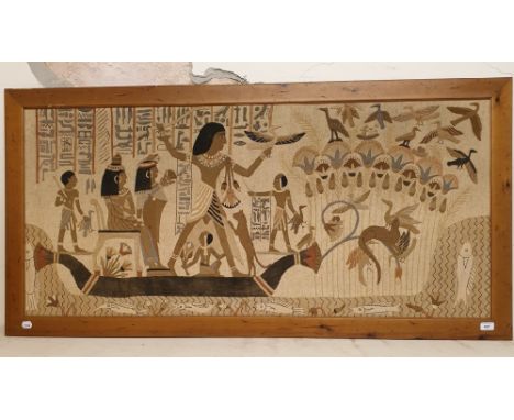 A needlework panel/hanging, decorated Egyptian figures, 63 x 139 cm 