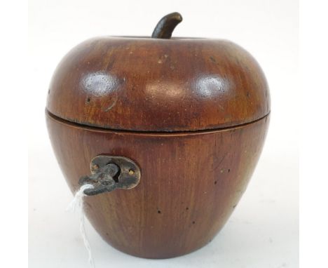 A painted treen tea caddy, in the form of an apple, 11.5 cm highReportModern 