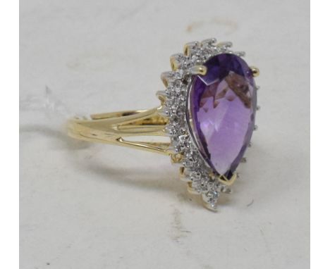 A 9ct gold pear shaped amethyst and diamond ring, approx. ring size N 