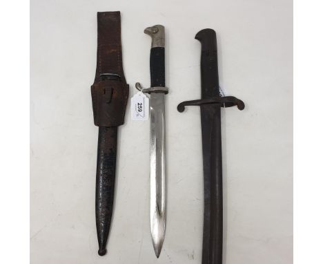 A German bayonet, with a scabbard, and another bayonet (2) 