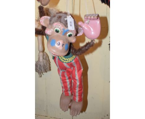 A large Pelham Puppet shop display monkey with an umbrella puppetReport by KBOne hole and fading to the umbrella.Fur loss to 