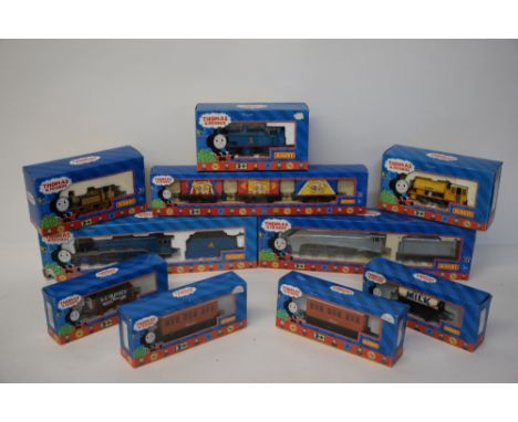 A collection of Hornby Thomas the Tank Engine locomotives and rolling stock including Thomas (R351), Bill (R9047), Stepney (R