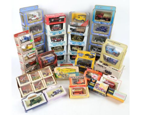A quantity of boxed diecast models including Corgi, Ertl and Solido. (qty)