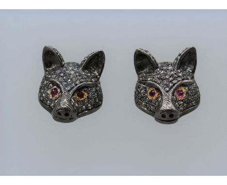 A pair of substantial diamond and ruby encrusted gilt silver fox earrings. Set with an estimated 2.12 carats of rose cut diam