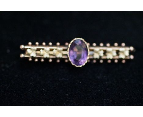 9ct Gold pin brooch set with amethyst  
