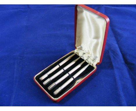 A delightful cased set of four matching ''STERLING SILVER''- stamped white-metal Pencils, each with engine-turned decoration 