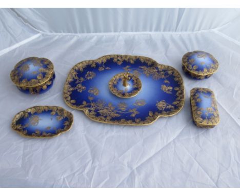 A pretty early 20th century Limoges DressingTable Set, comprising tray, a trinket tray, ring holder and three small lidded po