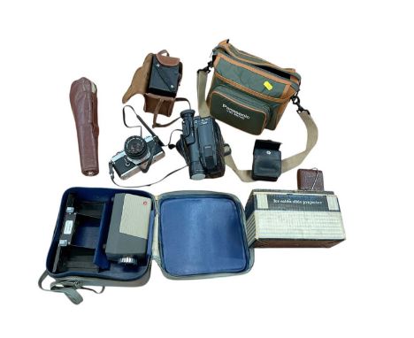 Group of cameras and accessories including an Olympus OM-1n