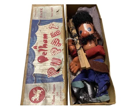 Rare Pelham puppet Hank, in original boxThe left leg is detached and one of the pistols is broken.  Box lid has two holes, st