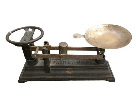 Collection of antique scales and weights, including a pair of Edwardian Fairbanks cast iron beam scales with sliding weight a