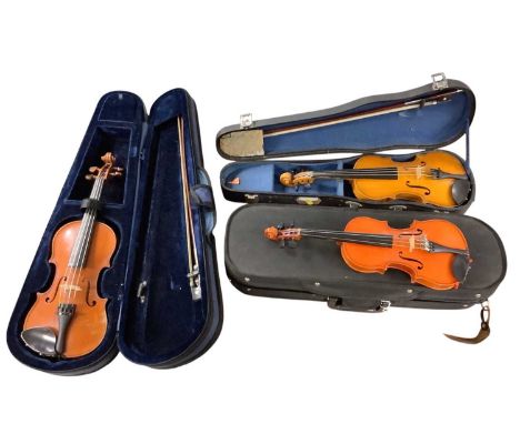 Eighth size, quarter size and half size violins, the latter by the London Violin Co Ltd (3)