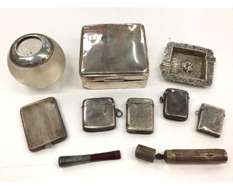 Group of silver and white metal smoking related items including silver mounted glass vesta globe, other vesta cases, ashtray,